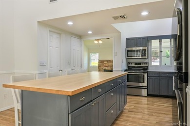 LOW TAXES!!! Welcome to this beautifully maintained 3-bedroom - photo 13