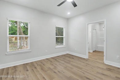 Welcome to effortless coastal living in this beautifully crafted - photo 16