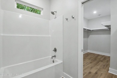 Welcome to effortless coastal living in this beautifully crafted - photo 18
