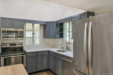 LOW TAXES!!! Welcome to this beautifully maintained 3-bedroom - photo 18