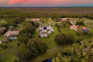 Situated on nearly 2 acres in the gated golf and equestrian - photo 5