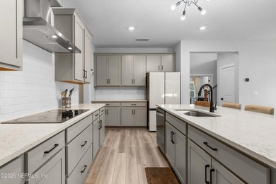 Welcome home to this beautifully designed 5-bedroom, 3.5-bath - photo 8