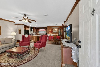 Welcome home to this beautifully maintained 2019 manufactured - photo 8