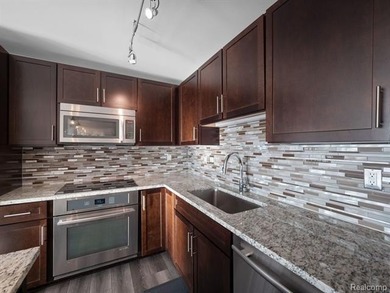 Highly sought-after Birmingham Place condo offering luxury - photo 9