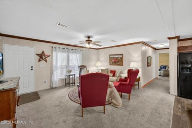 Welcome home to this beautifully maintained 2019 manufactured - photo 10