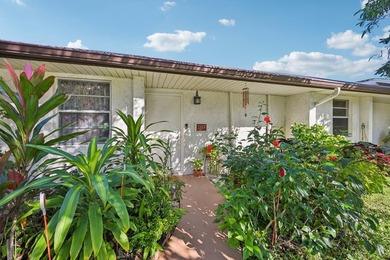 Welcome home to this charming 1-bedroom,1.5-bath VILLA located - photo 2