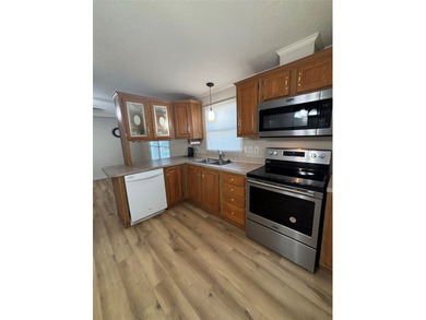 55 + Excellent opportunity to enjoy nearly carefree lifestyle - photo 11
