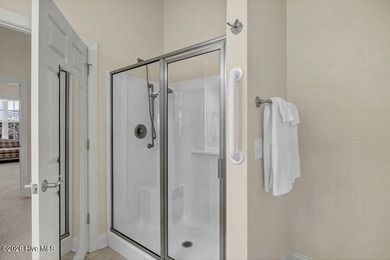 Welcome to 5410 Reserve Drive, a beautifully designed 3-bedroom