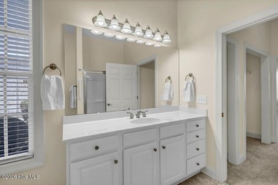 Welcome to 5410 Reserve Drive, a beautifully designed 3-bedroom