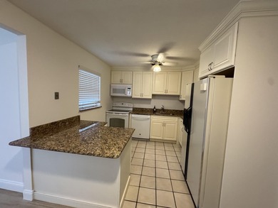 Discover practical living in this charming single-story - photo 4