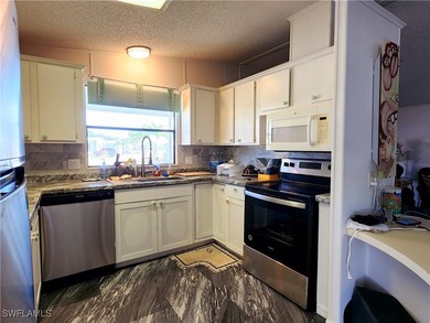 Turnkey! Fully furnished! Welcome to Pine Island Cove, a vibrant - photo 8