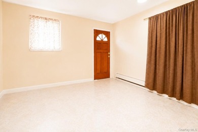 After 45 years, this charming semi-detached brick townhouse is - photo 12