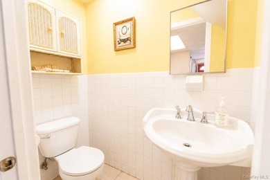 After 45 years, this charming semi-detached brick townhouse is - photo 13