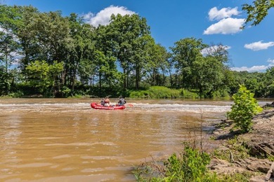 Experience direct Spring River frontage on 3.05 acres located on - photo 24