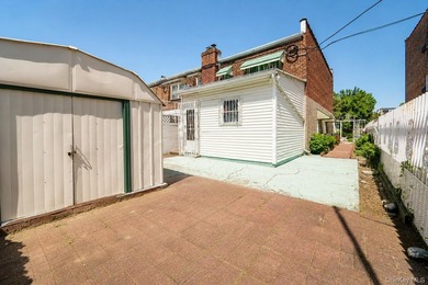 After 45 years, this charming semi-detached brick townhouse is - photo 24
