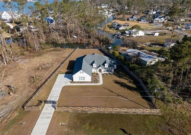 BEAUTIFUL PRACTICALLY NEW HOME (Built in 2023) on the CANAL with - photo 3