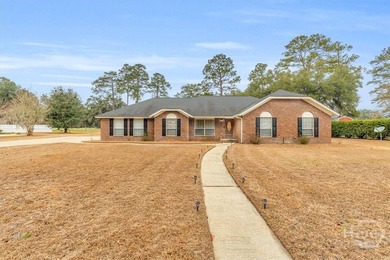Classic all-brick home perfectly positioned on Hole 1 of the - photo 1