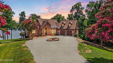 Experience luxury lakefront living in this exceptional 5-bedroom - photo 1