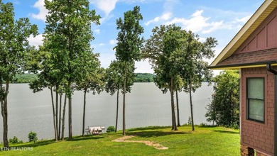 Experience luxury lakefront living in this exceptional 5-bedroom - photo 8