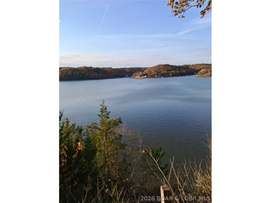 Wake up each day to breathtaking panoramic lake views from this - photo 11