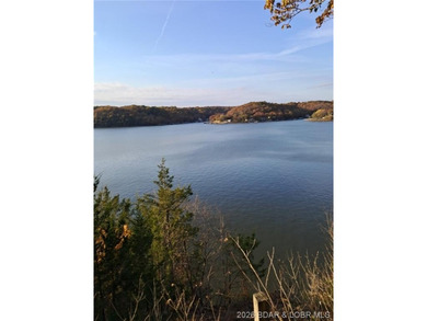 Wake up each day to breathtaking panoramic lake views from this - photo 11
