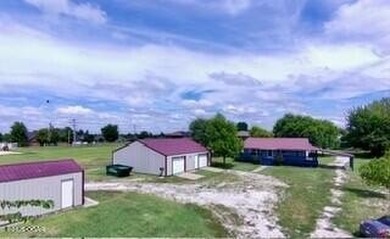 Commercial property encompassing roughly 1 acre, which includes