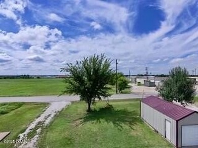 Commercial property encompassing roughly 1 acre, which includes