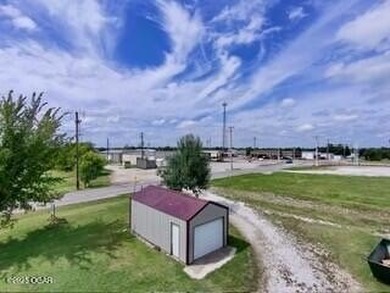 Commercial property encompassing roughly 1 acre, which includes