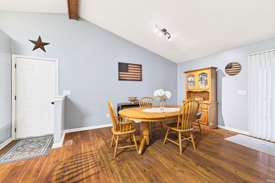 This brick ranch home sits in a peaceful wooded area at the end