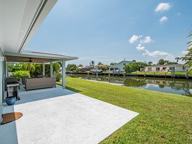 Welcome to this waterfront single-story residence in Coral Cove - photo 6