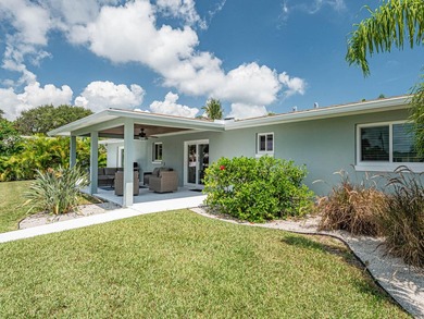 Welcome to this waterfront single-story residence in Coral Cove - photo 10