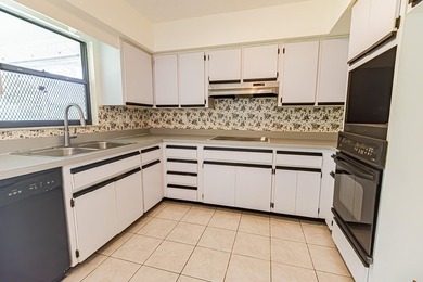 Opportunity awaits! This freshly painted 2-bedroom, 2-bath home - photo 9