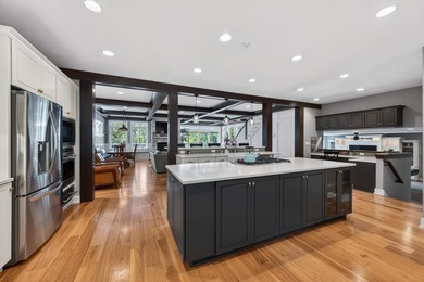 Completely reimagined and thoughtfully expanded, this Lake - photo 23