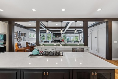 Completely reimagined and thoughtfully expanded, this Lake - photo 24