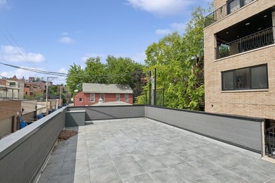 Welcome to this exceptional 4-bedroom, 3.1-bath duplex residence - photo 34