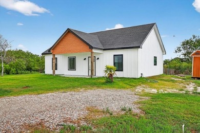 Charming 3-Bed, 2-Bath Home on Serene Pond in Rockport, Texas - photo 9