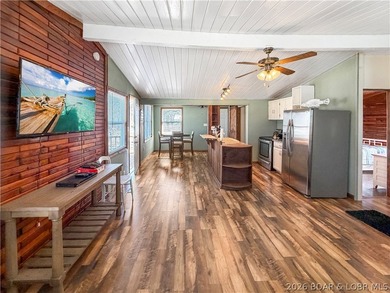 Enjoy the ease of lake living in this updated home with a swim - photo 11