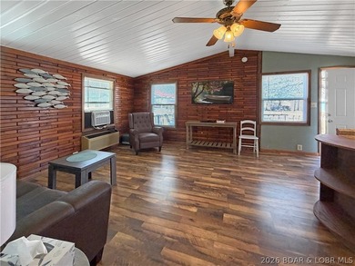 Enjoy the ease of lake living in this updated home with a swim - photo 12