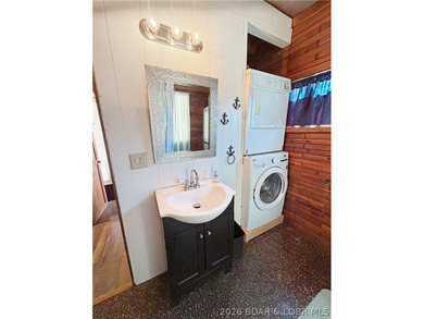 Enjoy the ease of lake living in this updated home with a swim - photo 21