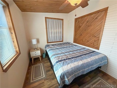 Enjoy the ease of lake living in this updated home with a swim - photo 25