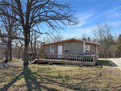 Enjoy the ease of lake living in this updated home with a swim - photo 29