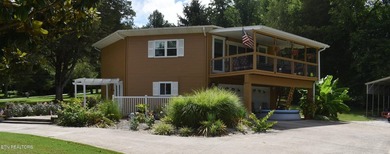 Discover this beautiful 3 bedroom, 2.5 bathroom LAKEFRONT home - photo 1