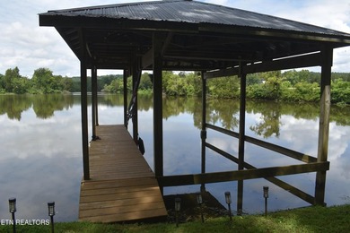 Discover this beautiful 3 bedroom, 2.5 bathroom LAKEFRONT home - photo 3