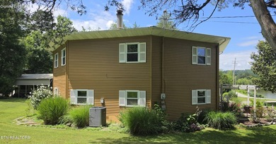 Discover this beautiful 3 bedroom, 2.5 bathroom LAKEFRONT home - photo 5