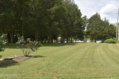 Discover this beautiful 3 bedroom, 2.5 bathroom LAKEFRONT home - photo 8