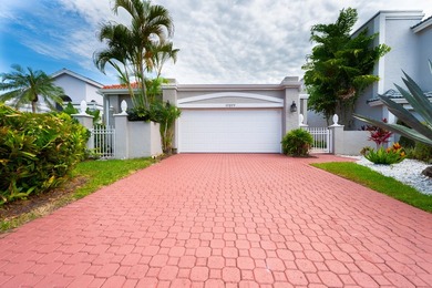 Welcome to this 3/2 house in the central-Boca neighborhood of - photo 1