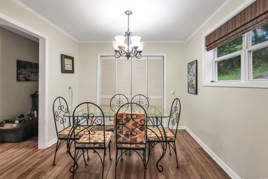 Enjoy seasonal views of Lake Greeson from this 3-bedroom, 2-bath - photo 12