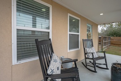 Nestled in the waterfront community of Holiday Beach, this - photo 12