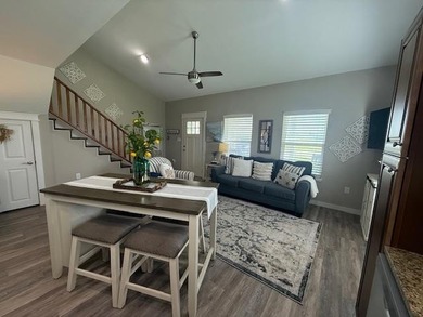 Nestled in the waterfront community of Holiday Beach, this - photo 23