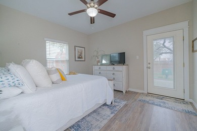 Nestled in the waterfront community of Holiday Beach, this - photo 24